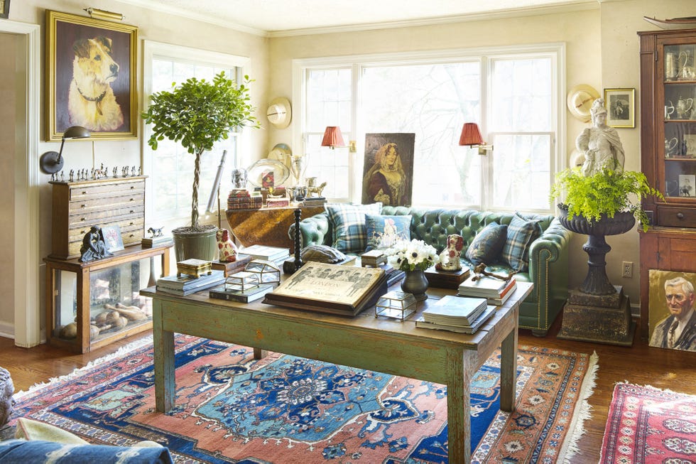 living room paint in buttery yellow in a rich living room filled with antiques