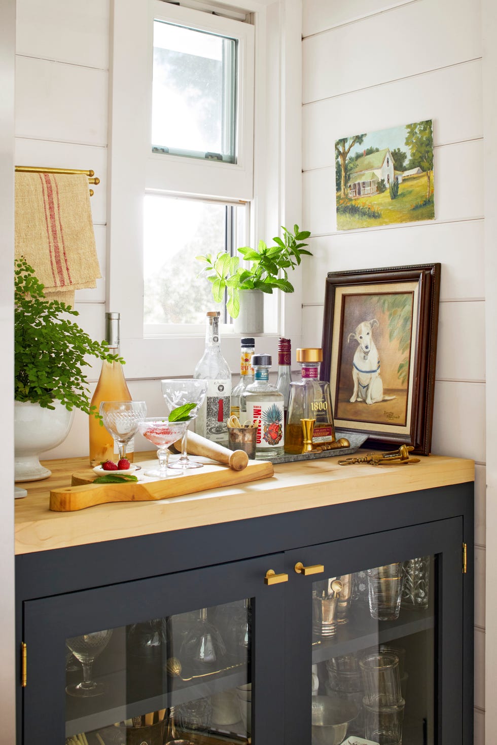 vintage glassware built in bar cabinet built in bar cabinet with vintage paintings and glassware butcher block countertops