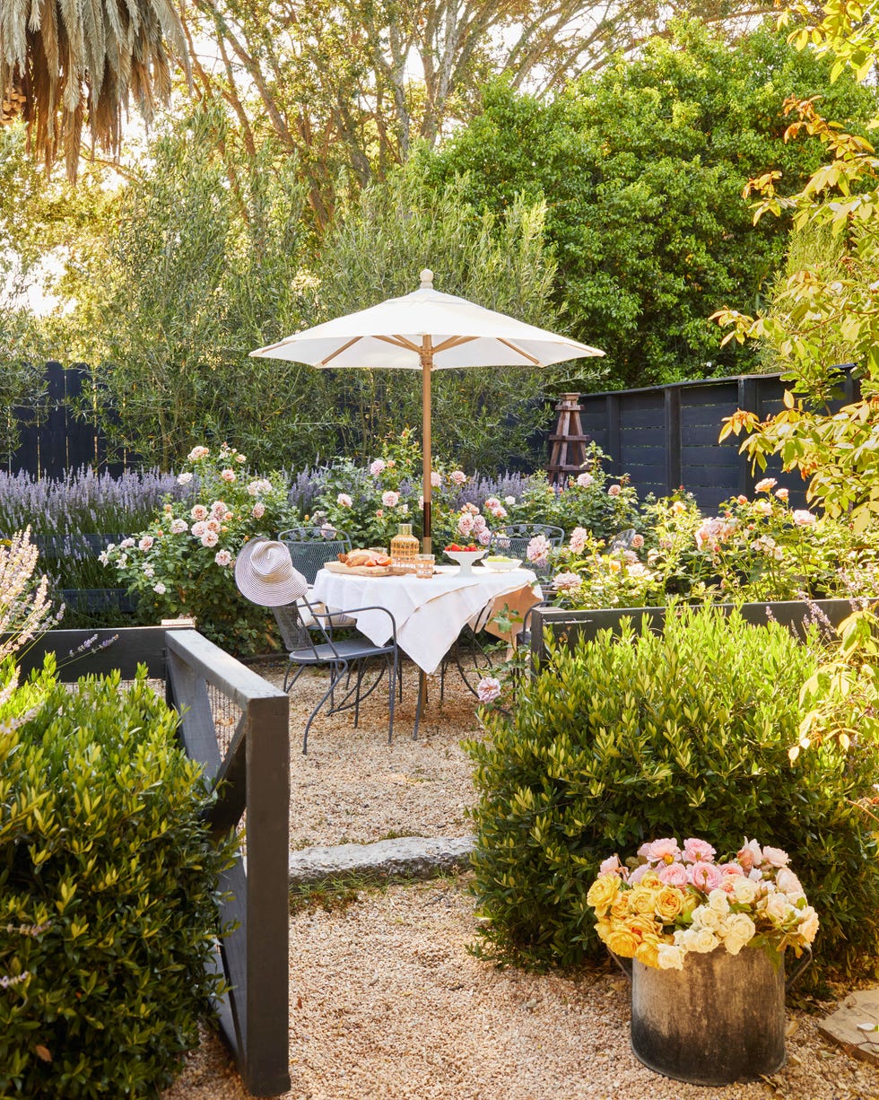 outdoor dining area in a rose and lavender garden outdoor dining table and chairs in a rose and lavender garden