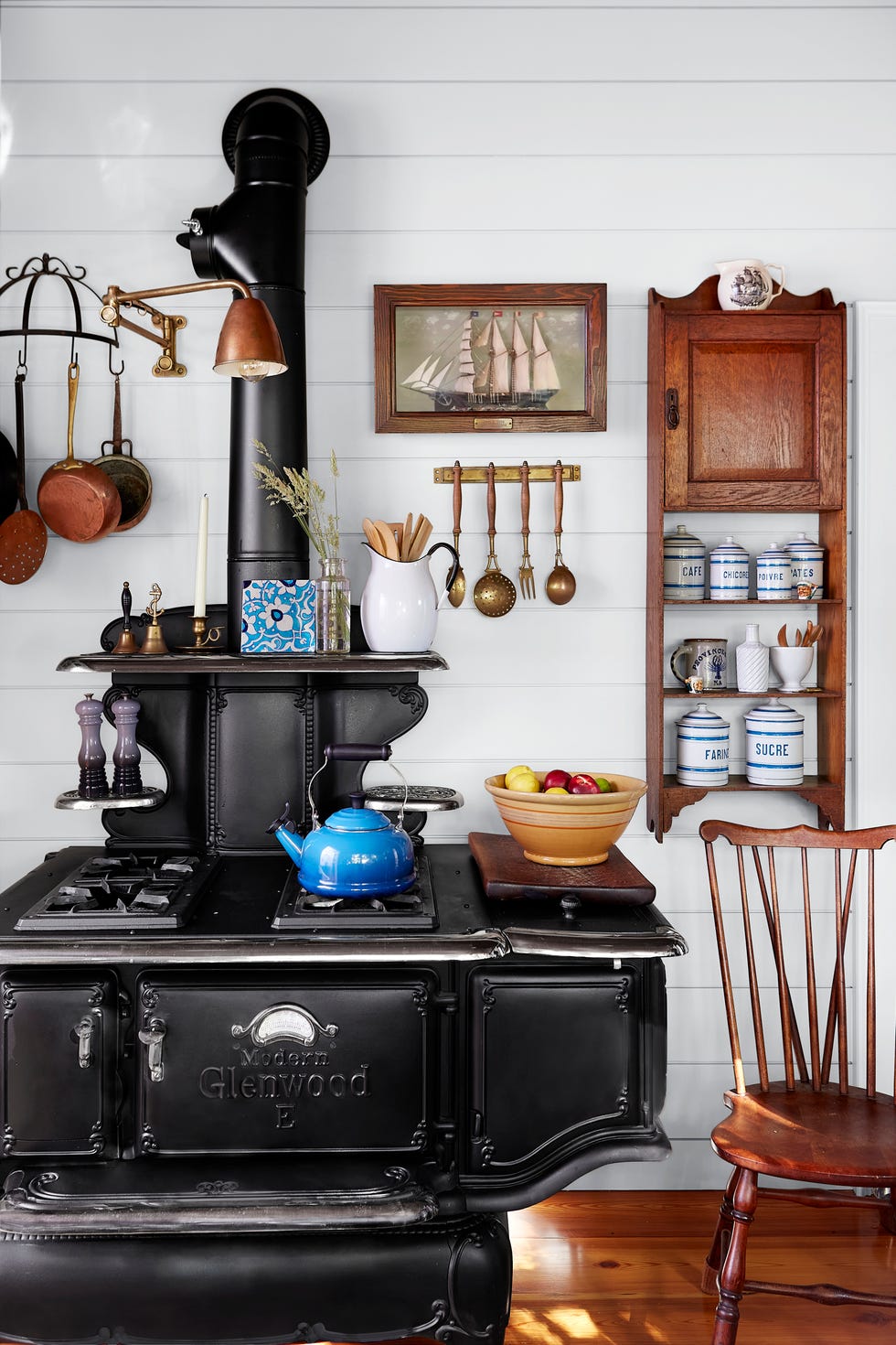 Groggy Anchor Cape Cod Cottage Stove home of steve ballerini and colin bohrer, one of the oldest cape cottages in provincetown, massachusetts cape cod cottage, cape cod style home kitchen with glenwood stove