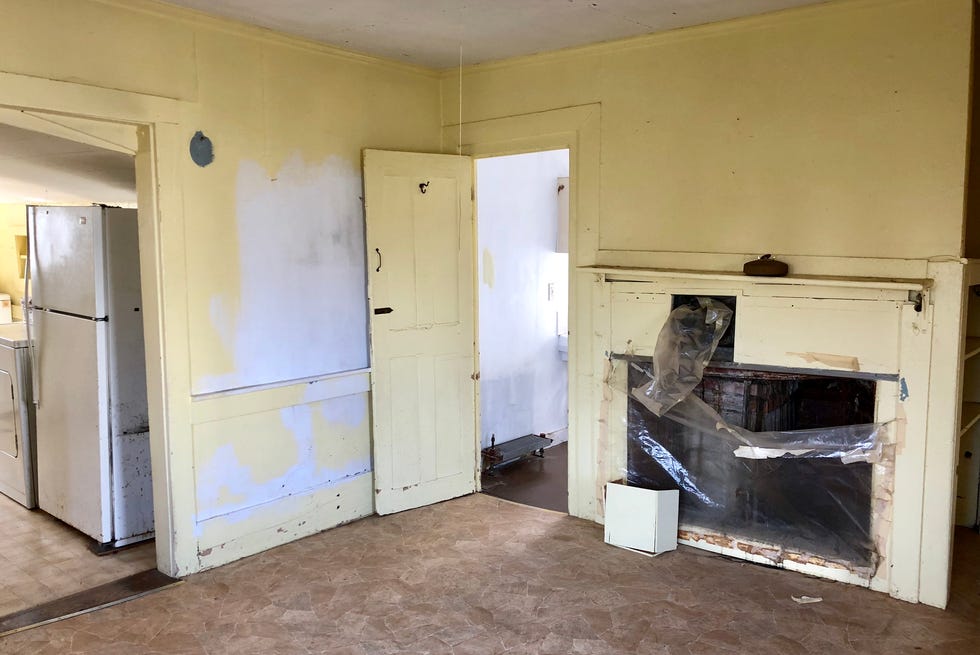 before shot of a yellow room in disrepair before shot of a yellow room in disrepair