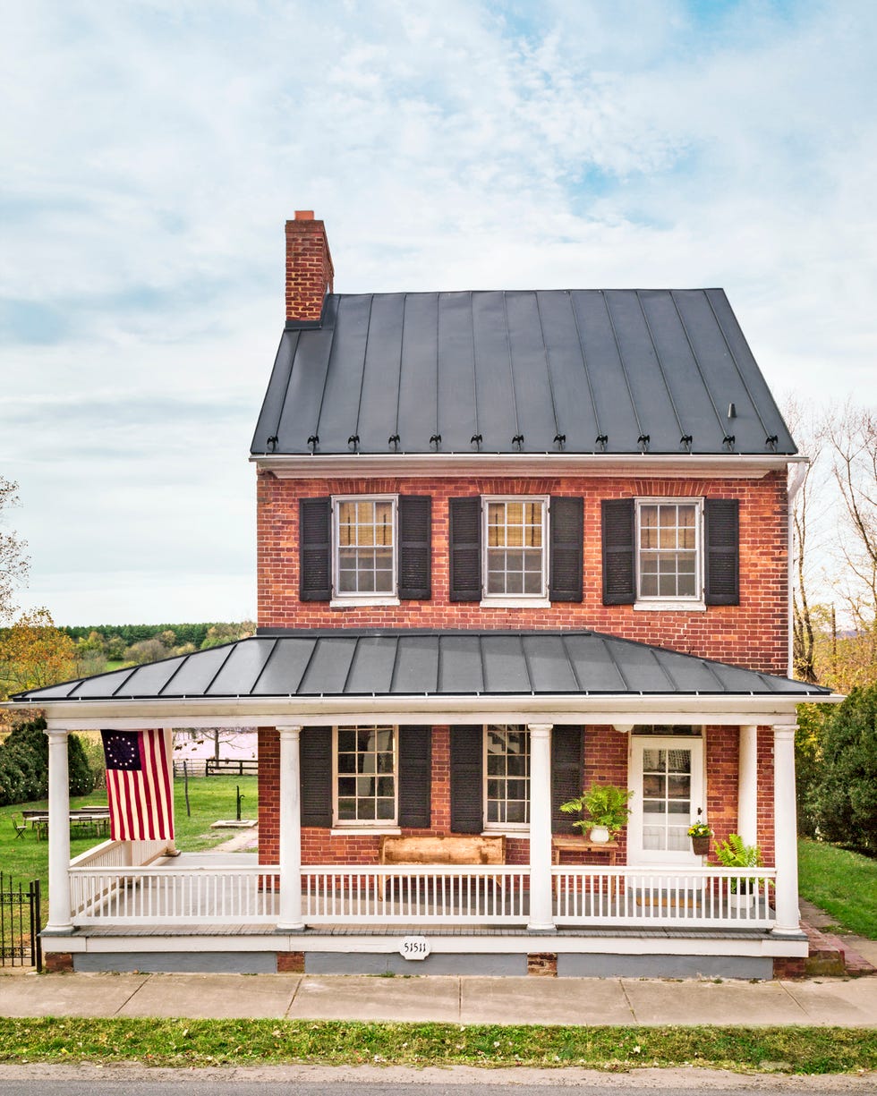 historic brick house with wraparound porch historic brick house with wraparound porch