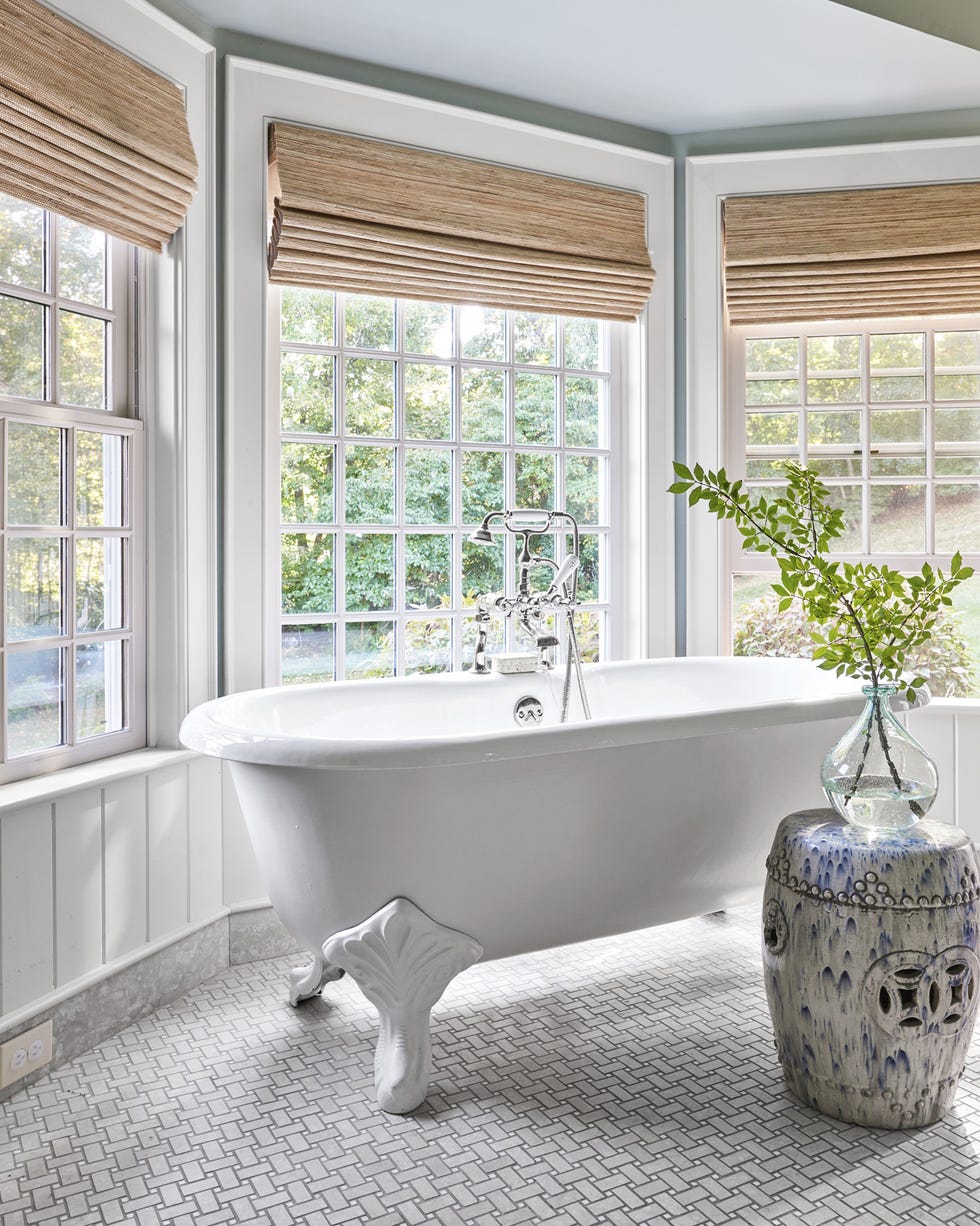 bathroom hexagonal tile floor bathroom with white clawfoot tub and tile floor laid in a basketweave pattern