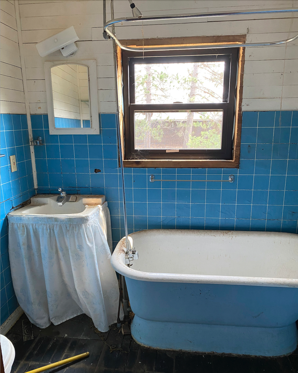 before shot of blue bathroom