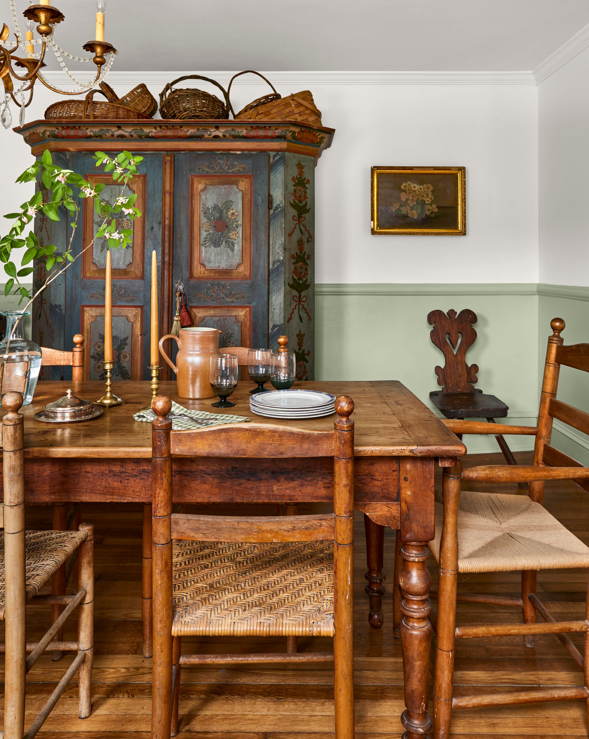 dining room with antique cabinet and wood table an chairs