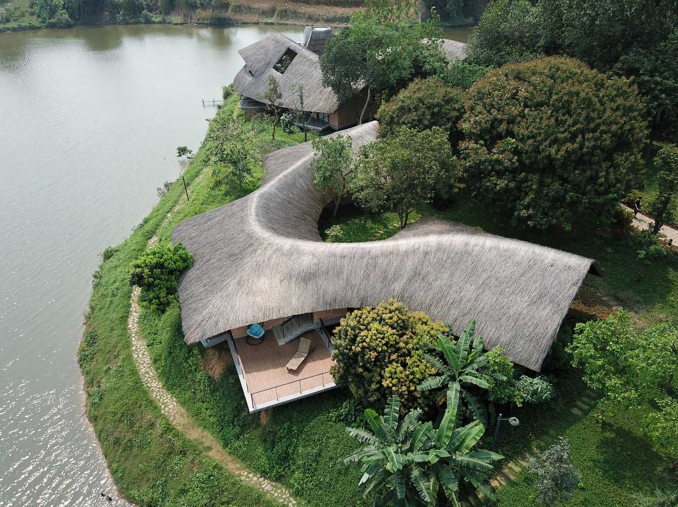 Unique Straw Roof Shape in Contemporary Bungalow