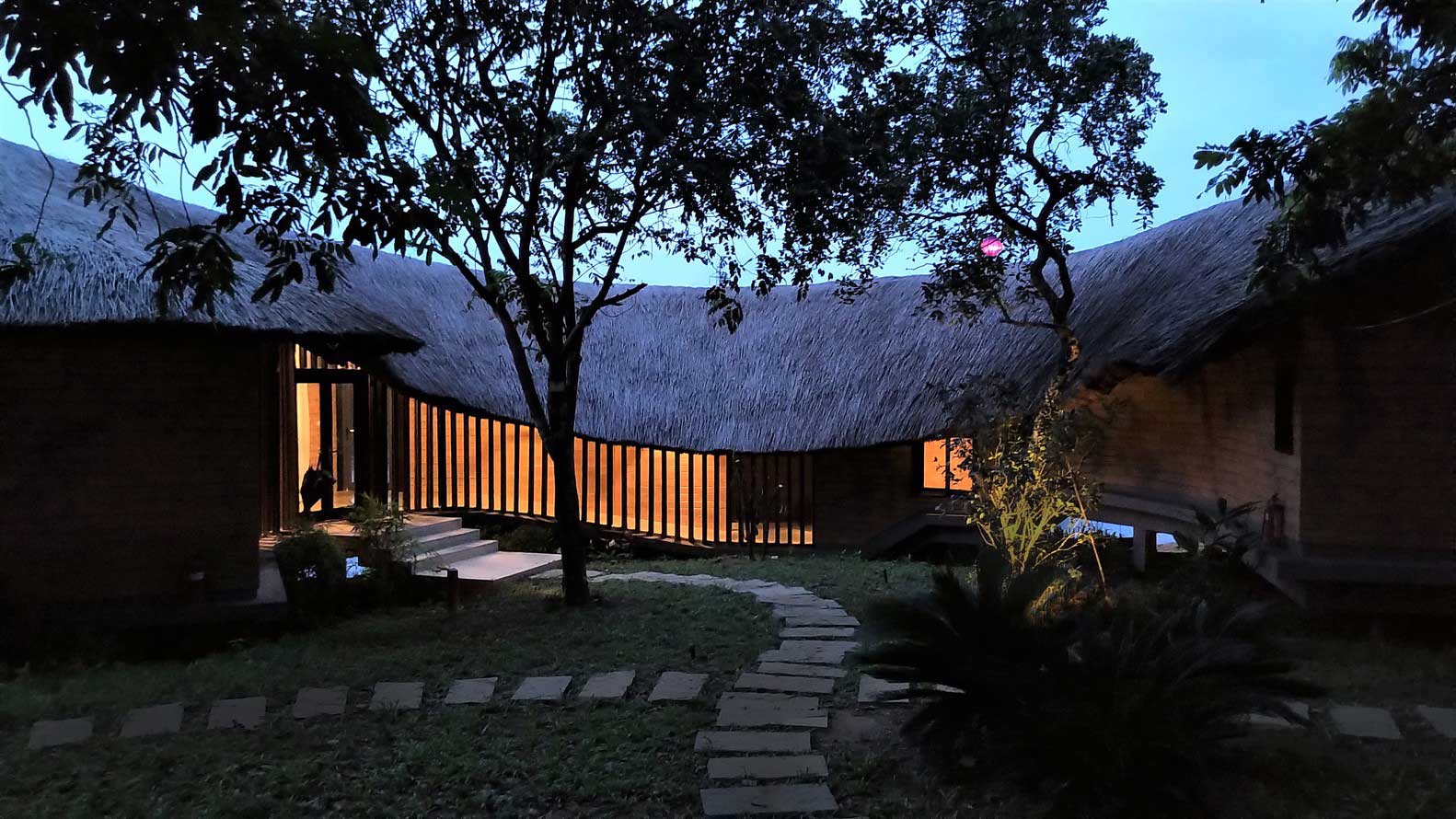 Unique Straw Roof Shape in Contemporary Bungalow